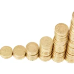 Coins stacked in ascending order symbolizing investing