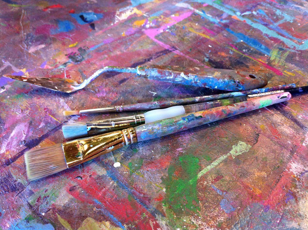 Painter palette and paintbrushes