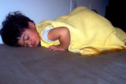 Person sleeping in bed