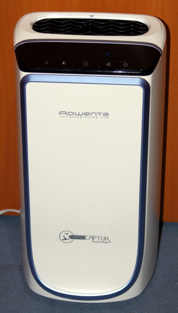 Air purifier running in a home living room