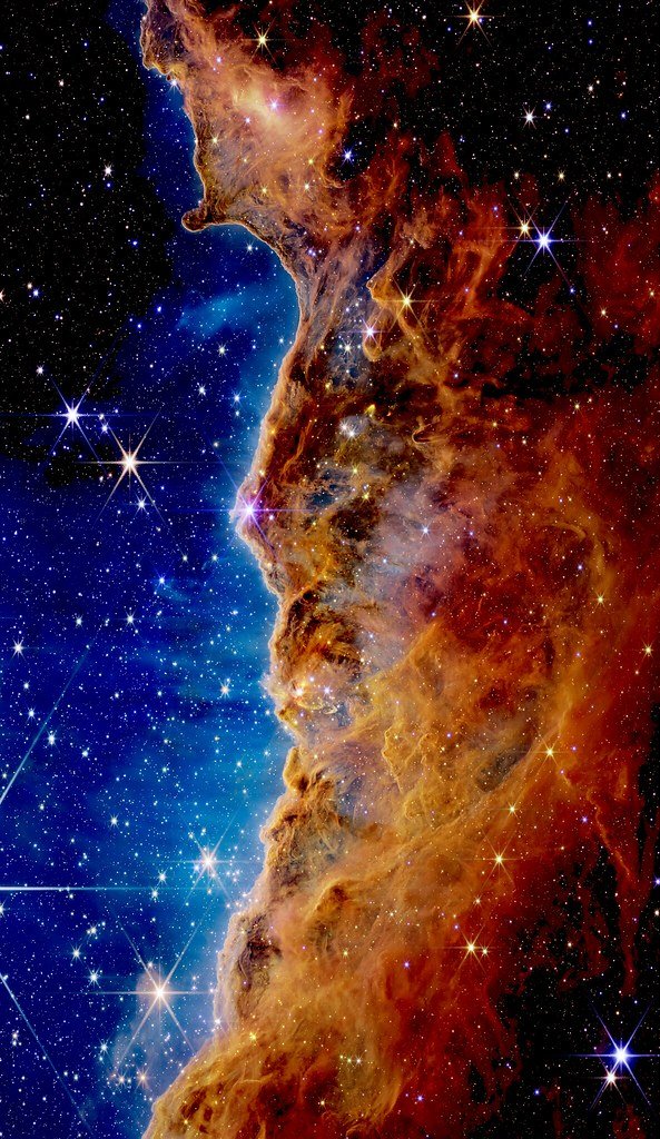 Cosmic Cliffs in the Carina Nebula, captured by the James Webb Space Telescope
