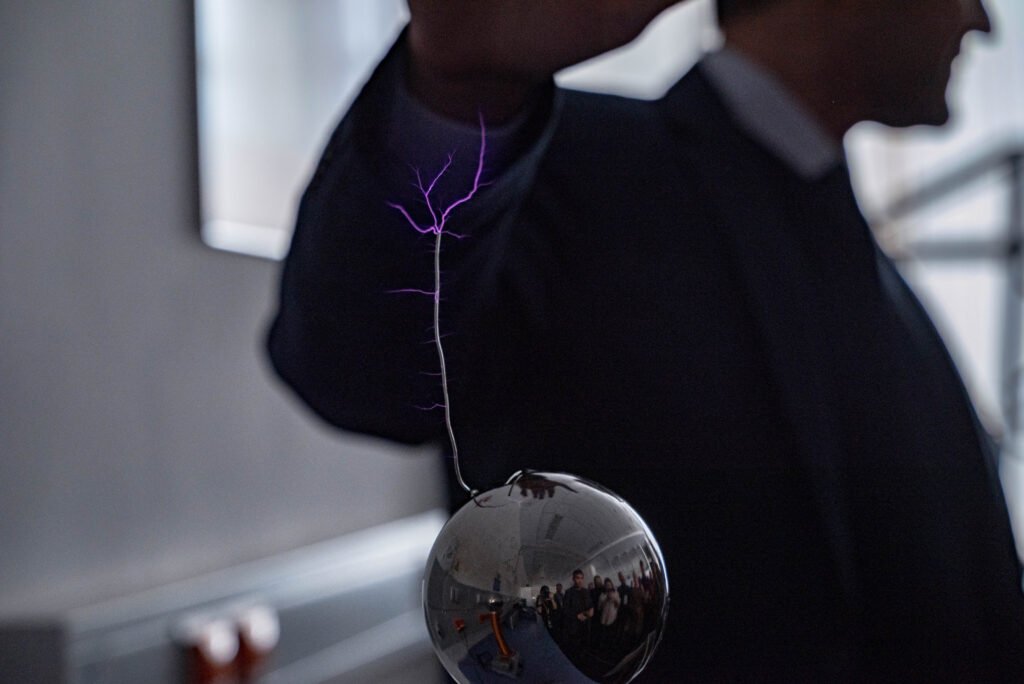 Spark of static electricity jumping between a finger and a metal doorknob