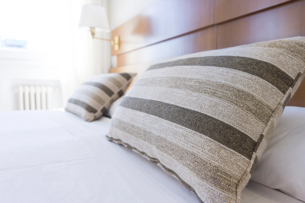 White pillow on a bed