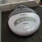 Robot vacuum cleaning a living room floor