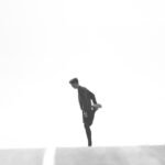 Runner stretching their leg