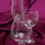 Glass of red wine on a wooden table