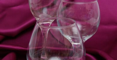 Glass of red wine on a wooden table